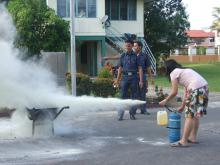 Practising Using the Fire Extinguisher